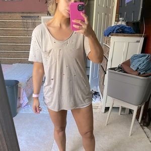 Distressed v neck, worn once! Tan/taupe color